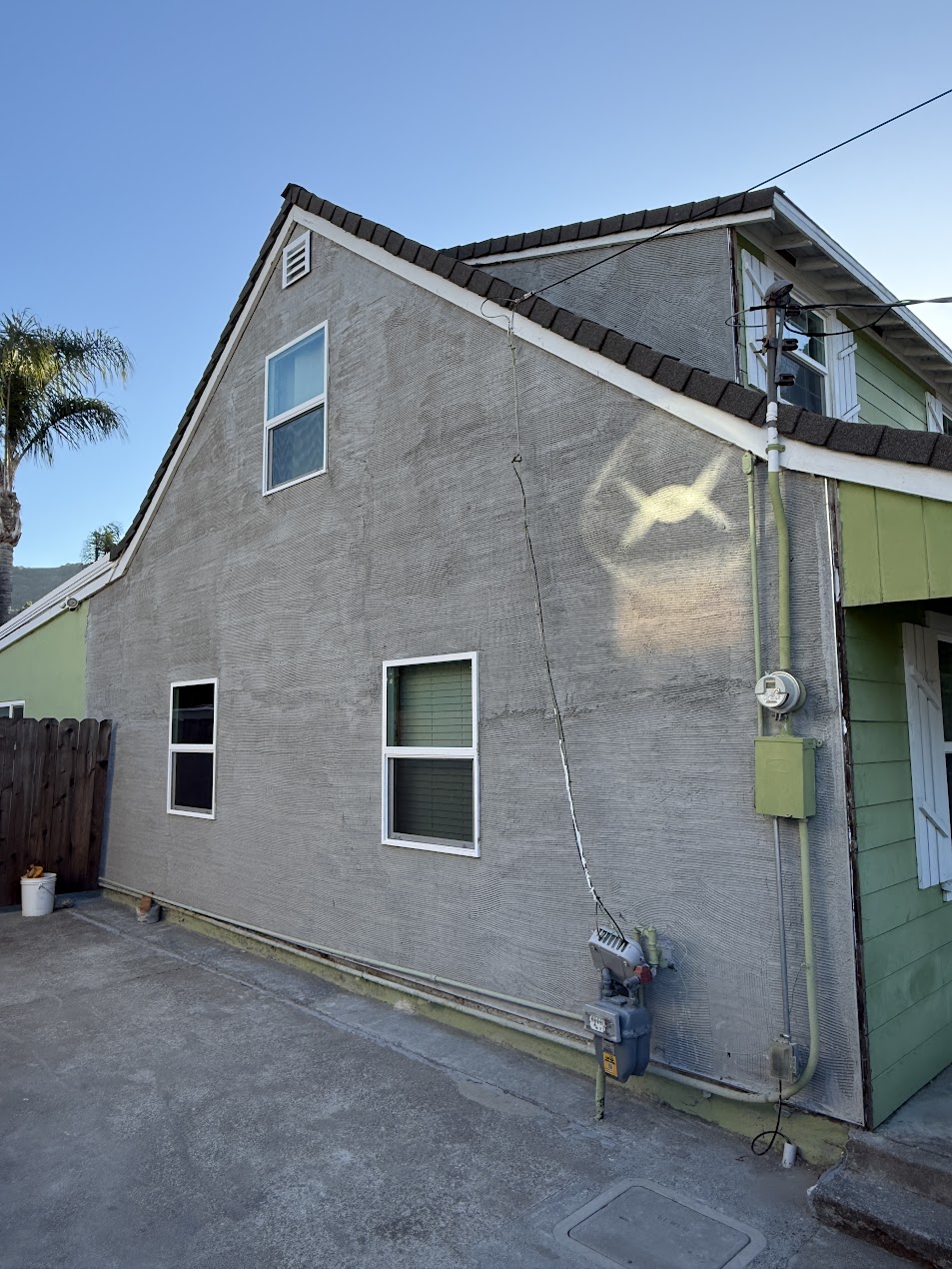 Stucco being applied